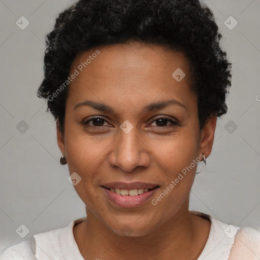 Joyful latino adult female with short  brown hair and brown eyes