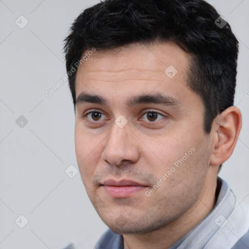 Neutral white young-adult male with short  black hair and brown eyes