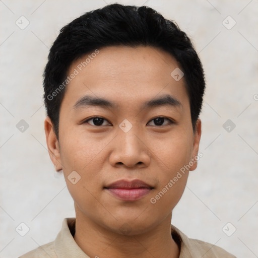 Joyful asian young-adult male with short  black hair and brown eyes