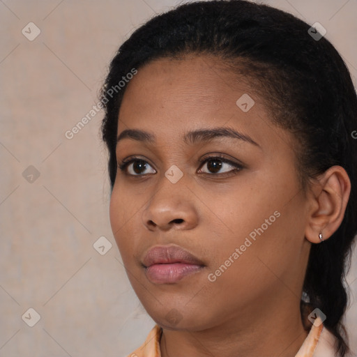 Neutral black young-adult female with medium  black hair and brown eyes