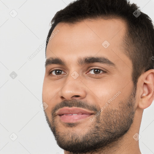 Neutral white young-adult male with short  black hair and brown eyes