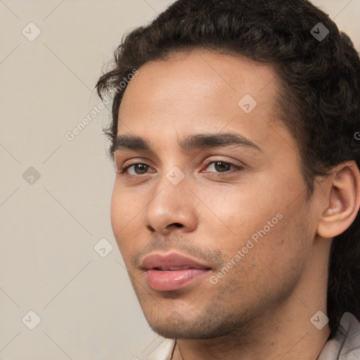 Neutral white young-adult male with short  black hair and brown eyes