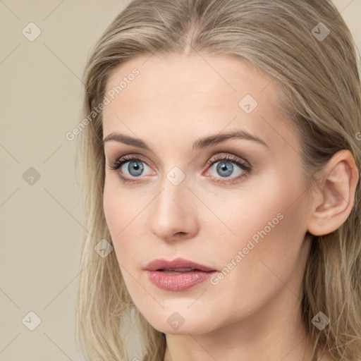 Neutral white young-adult female with long  brown hair and grey eyes