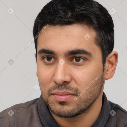 Neutral white young-adult male with short  black hair and brown eyes