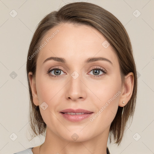 Joyful white young-adult female with medium  brown hair and grey eyes