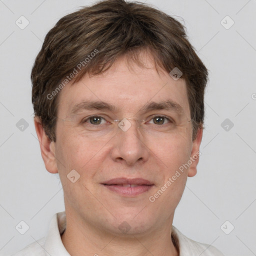 Joyful white adult male with short  brown hair and grey eyes