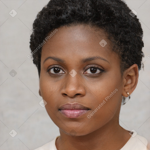 Neutral black young-adult female with short  brown hair and brown eyes