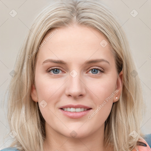 Joyful white young-adult female with medium  brown hair and blue eyes