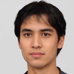 Neutral asian young-adult male with short  brown hair and brown eyes