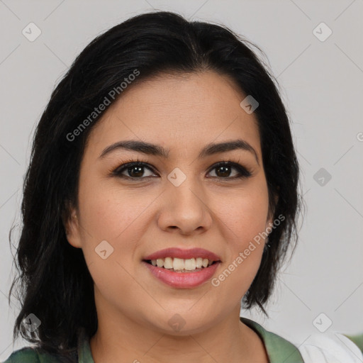 Joyful latino young-adult female with medium  black hair and brown eyes