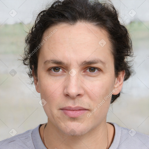 Joyful white adult male with medium  brown hair and brown eyes