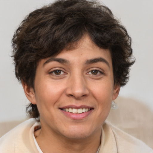 Joyful white adult female with medium  brown hair and brown eyes