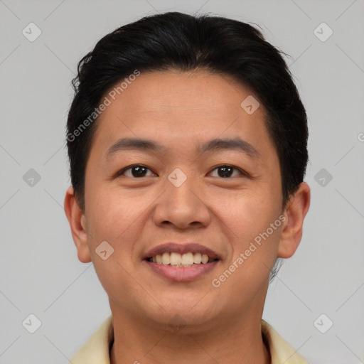 Joyful asian young-adult male with short  brown hair and brown eyes
