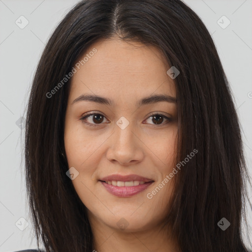 Joyful asian young-adult female with long  brown hair and brown eyes