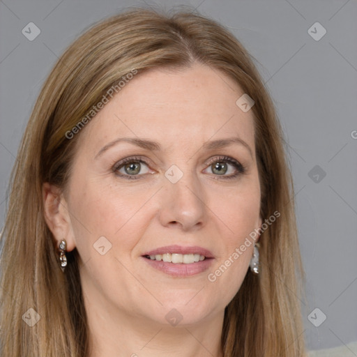 Joyful white adult female with long  brown hair and grey eyes