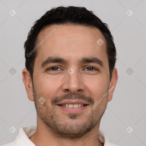 Joyful white young-adult male with short  brown hair and brown eyes