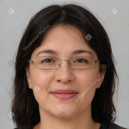 Joyful white adult female with medium  brown hair and brown eyes