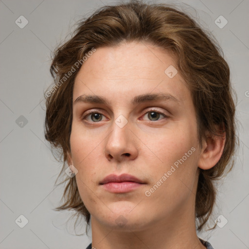 Neutral white young-adult female with medium  brown hair and green eyes