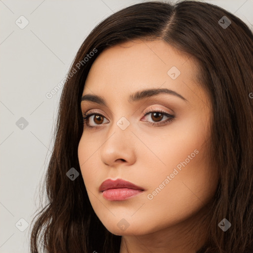 Neutral white young-adult female with long  brown hair and brown eyes