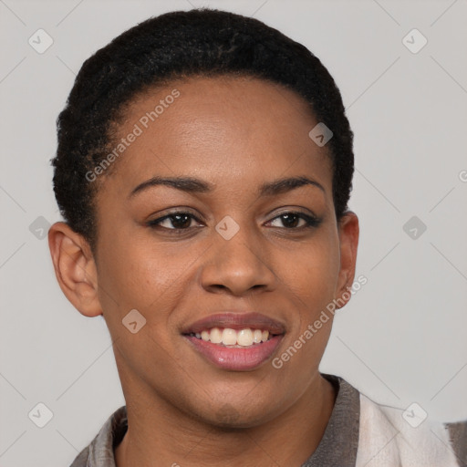 Joyful black young-adult female with short  brown hair and brown eyes