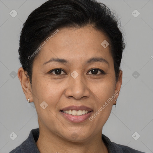 Joyful white adult female with short  brown hair and brown eyes