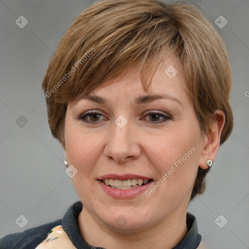 Joyful white adult female with medium  brown hair and grey eyes