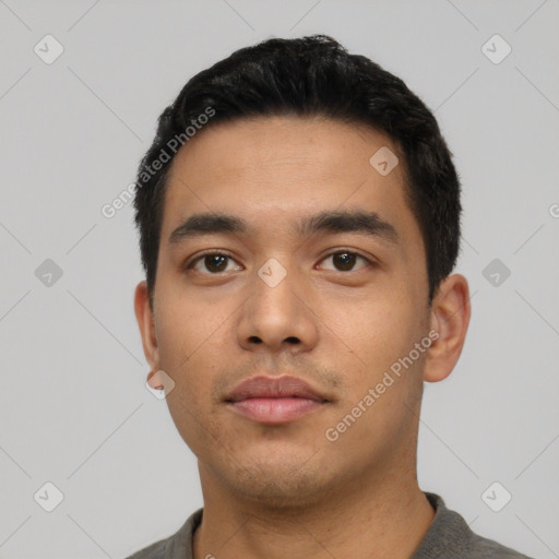 Neutral asian young-adult male with short  black hair and brown eyes