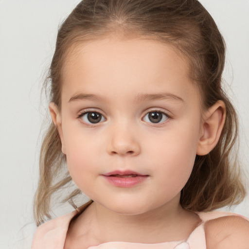 Neutral white child female with medium  brown hair and brown eyes