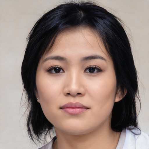 Neutral asian young-adult female with medium  black hair and brown eyes