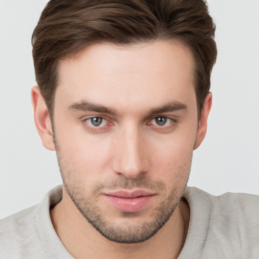 Neutral white young-adult male with short  brown hair and brown eyes