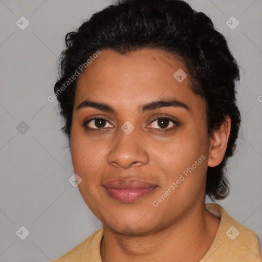 Joyful latino young-adult female with short  brown hair and brown eyes