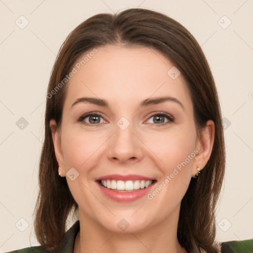 Joyful white young-adult female with medium  brown hair and green eyes