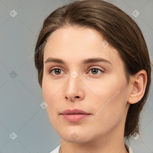 Neutral white young-adult female with medium  brown hair and brown eyes