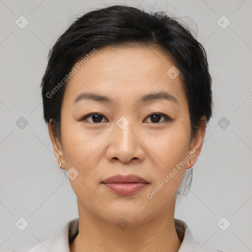 Joyful asian young-adult female with short  brown hair and brown eyes