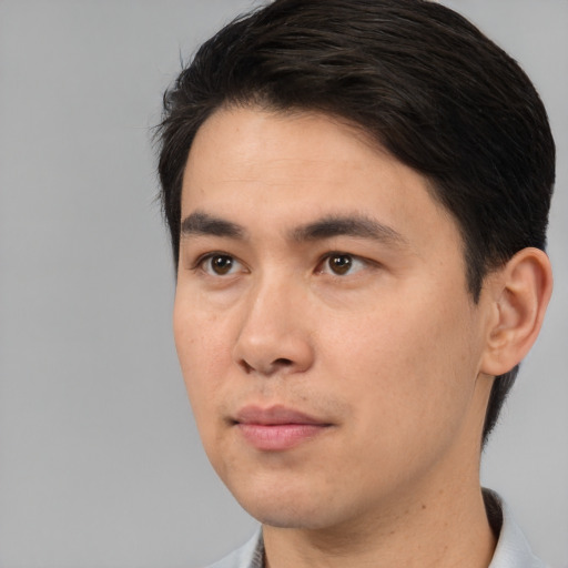 Neutral asian young-adult male with short  brown hair and brown eyes