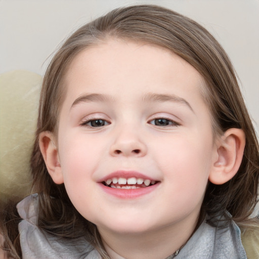 Joyful white child female with medium  brown hair and blue eyes