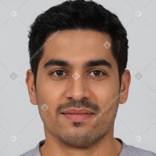 Neutral latino young-adult male with short  black hair and brown eyes