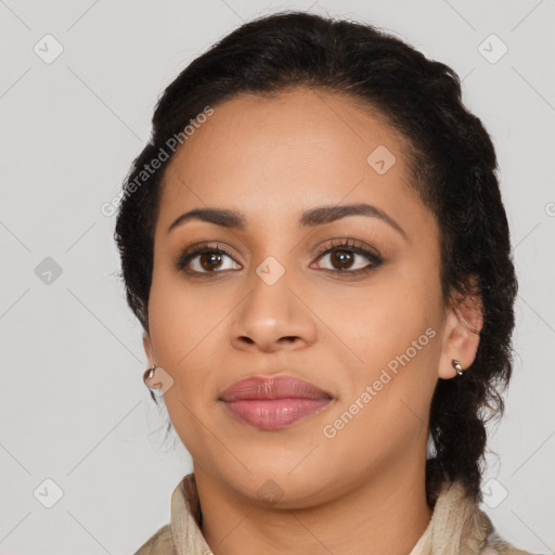 Joyful latino young-adult female with long  brown hair and brown eyes