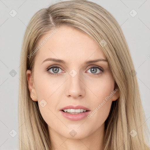 Joyful white young-adult female with long  brown hair and blue eyes