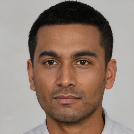 Neutral latino young-adult male with short  black hair and brown eyes