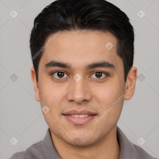 Joyful asian young-adult male with short  black hair and brown eyes