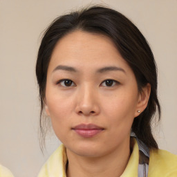 Neutral asian young-adult female with medium  brown hair and brown eyes