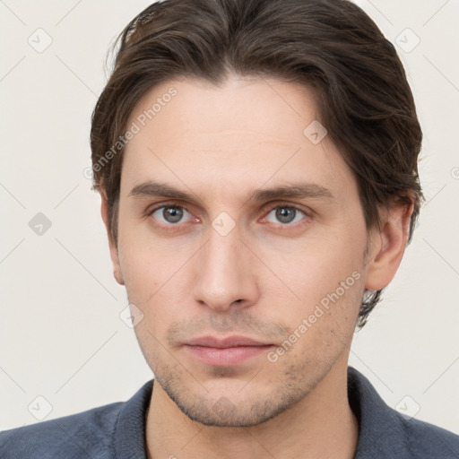 Neutral white young-adult male with short  brown hair and brown eyes