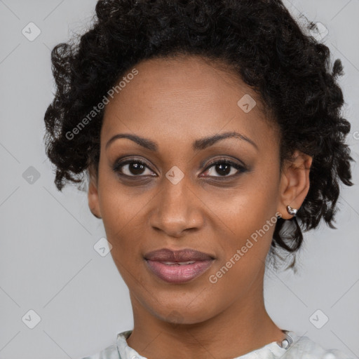 Joyful black young-adult female with medium  black hair and brown eyes