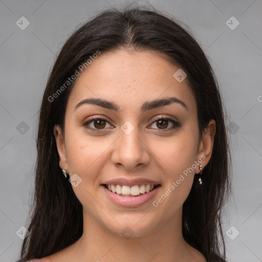 Joyful white young-adult female with long  brown hair and brown eyes