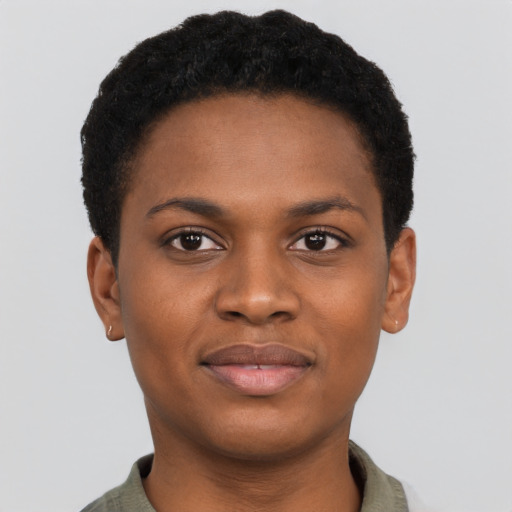 Joyful black young-adult female with short  black hair and brown eyes