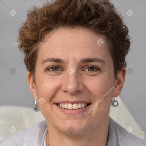 Joyful white adult female with short  brown hair and brown eyes