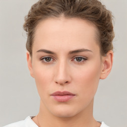 Neutral white young-adult female with short  brown hair and brown eyes