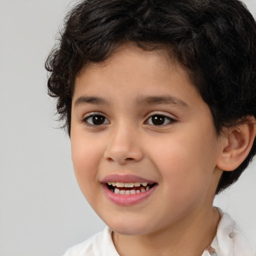 Joyful white child female with short  brown hair and brown eyes