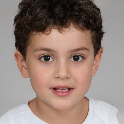 Joyful white child male with short  brown hair and brown eyes